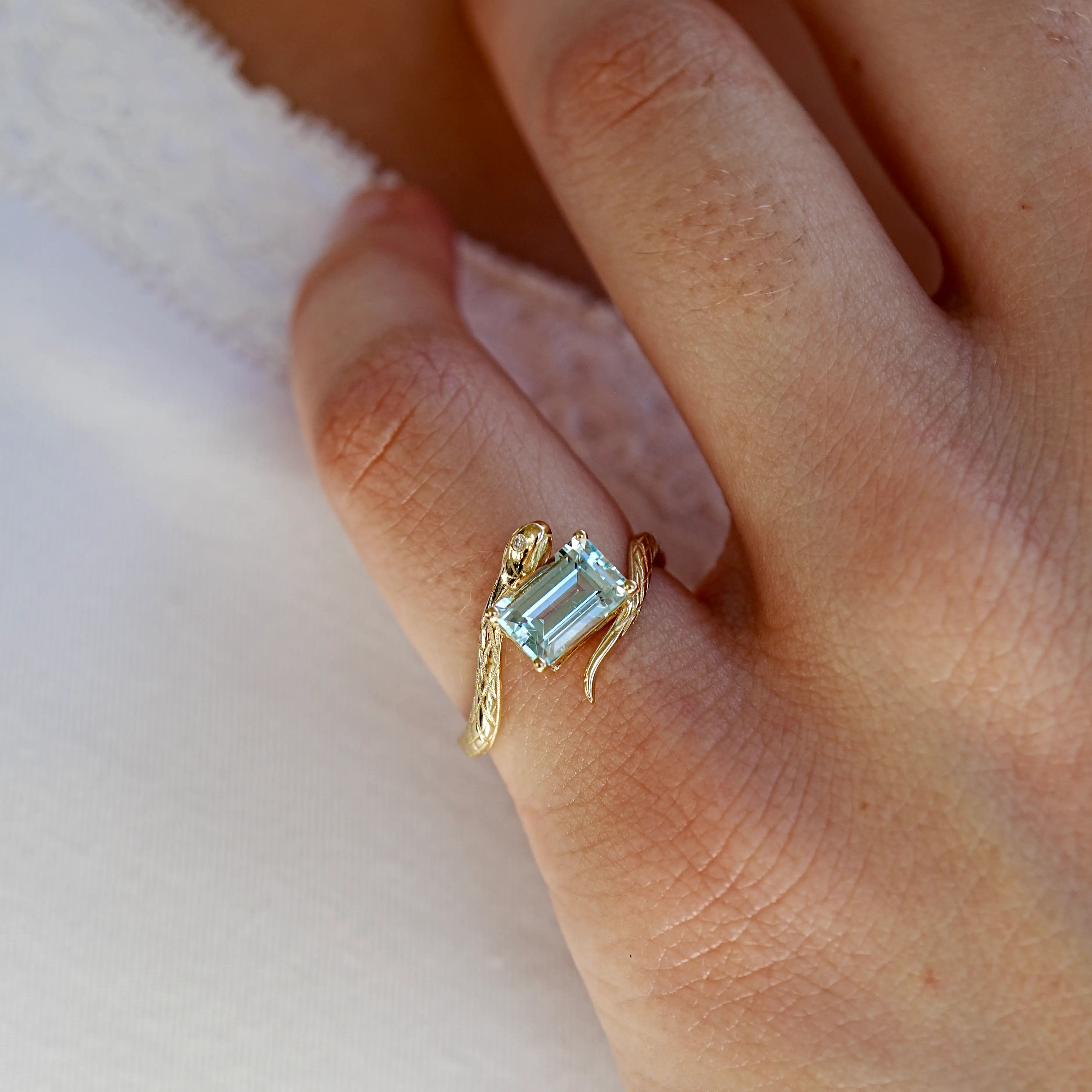 Snake Protection Natural Emerald-Cut Aquamarine & Diamond East-West Ring 14k yellow gold