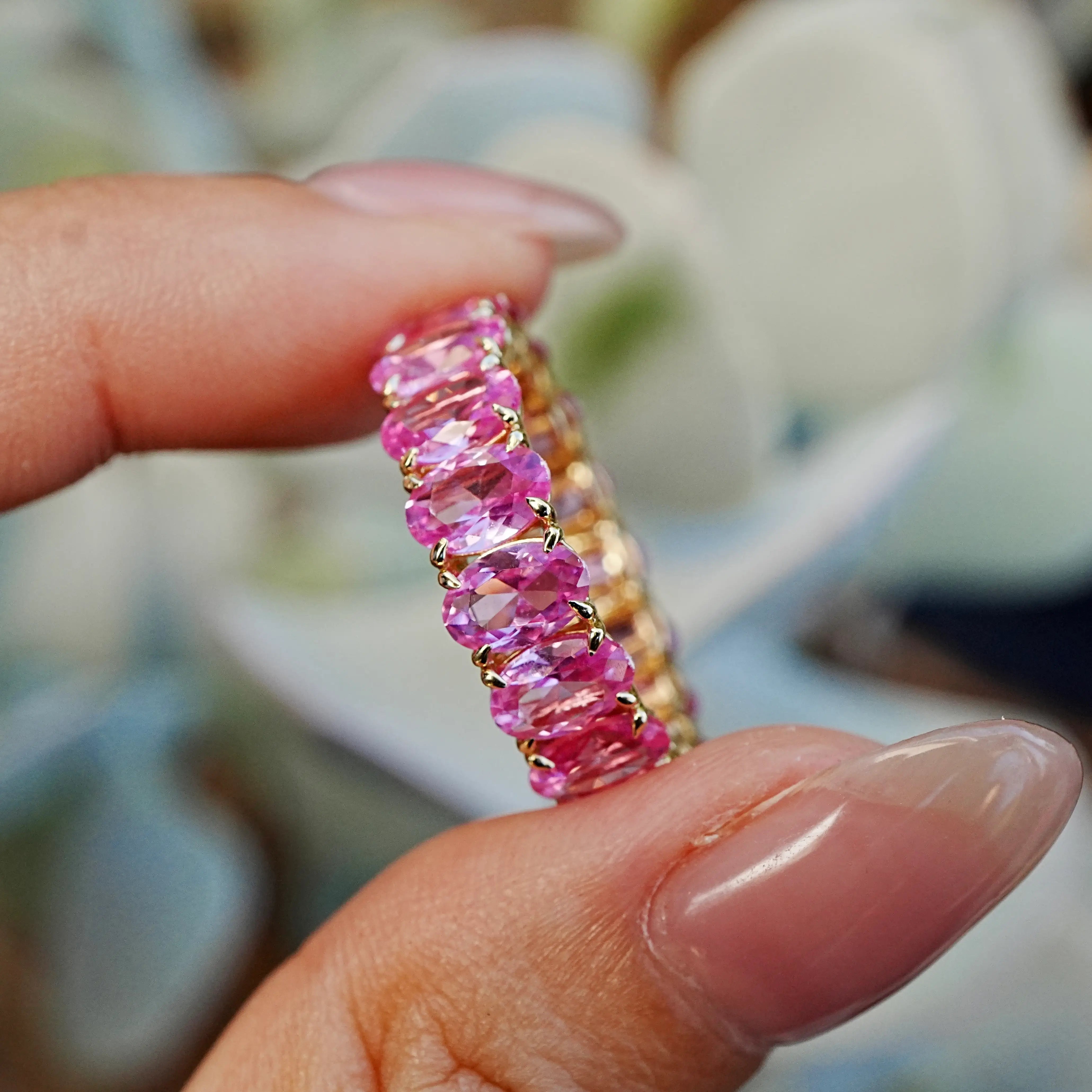 Nora 11.50 ctw Oval Lab Grown Pink Sapphire Eternity Ring in 14k yellow gold