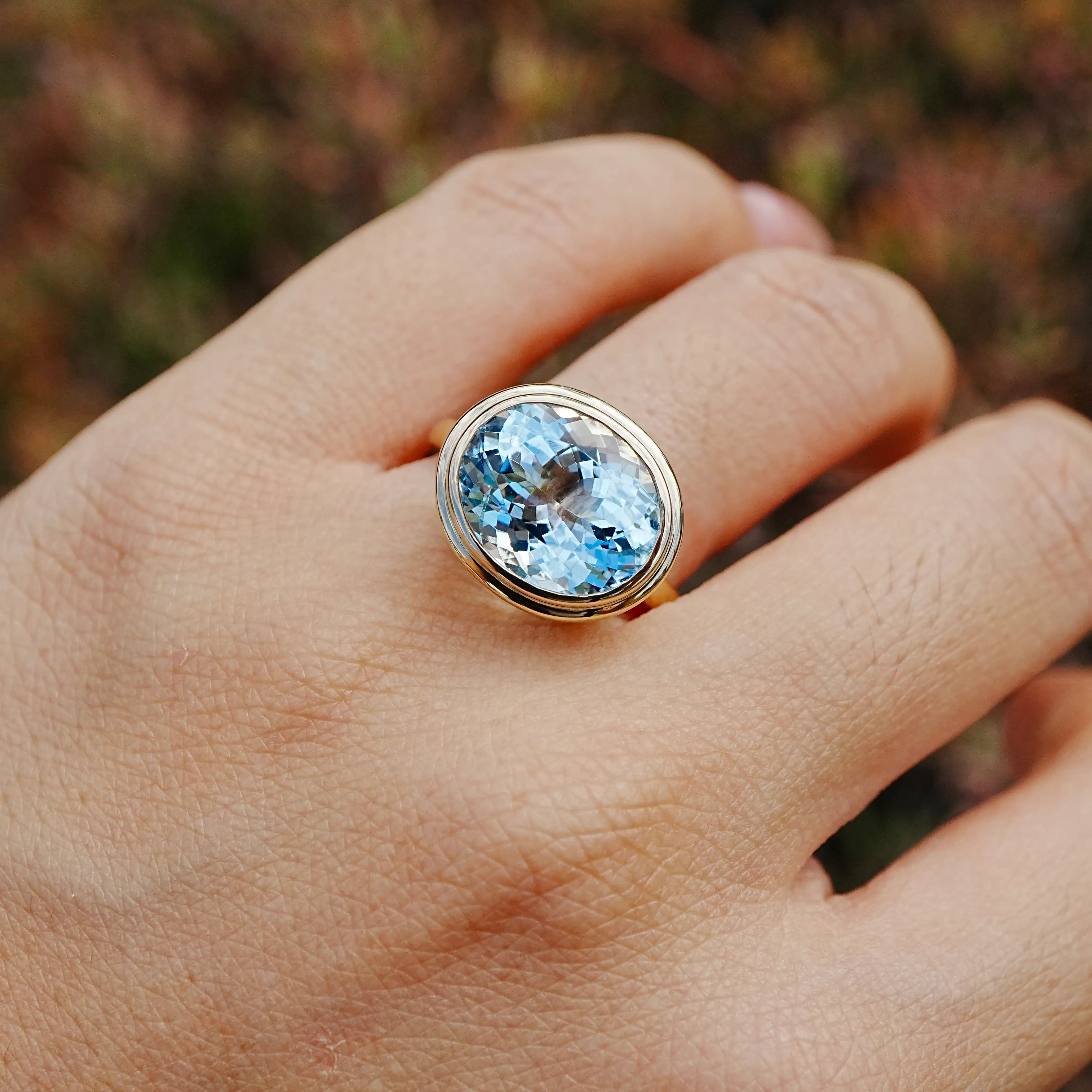 certificate of Bella 4.95 ct AIGS Certified Aquamarine East-West Ring in 14k yellow gold (One-of-a-Kind)