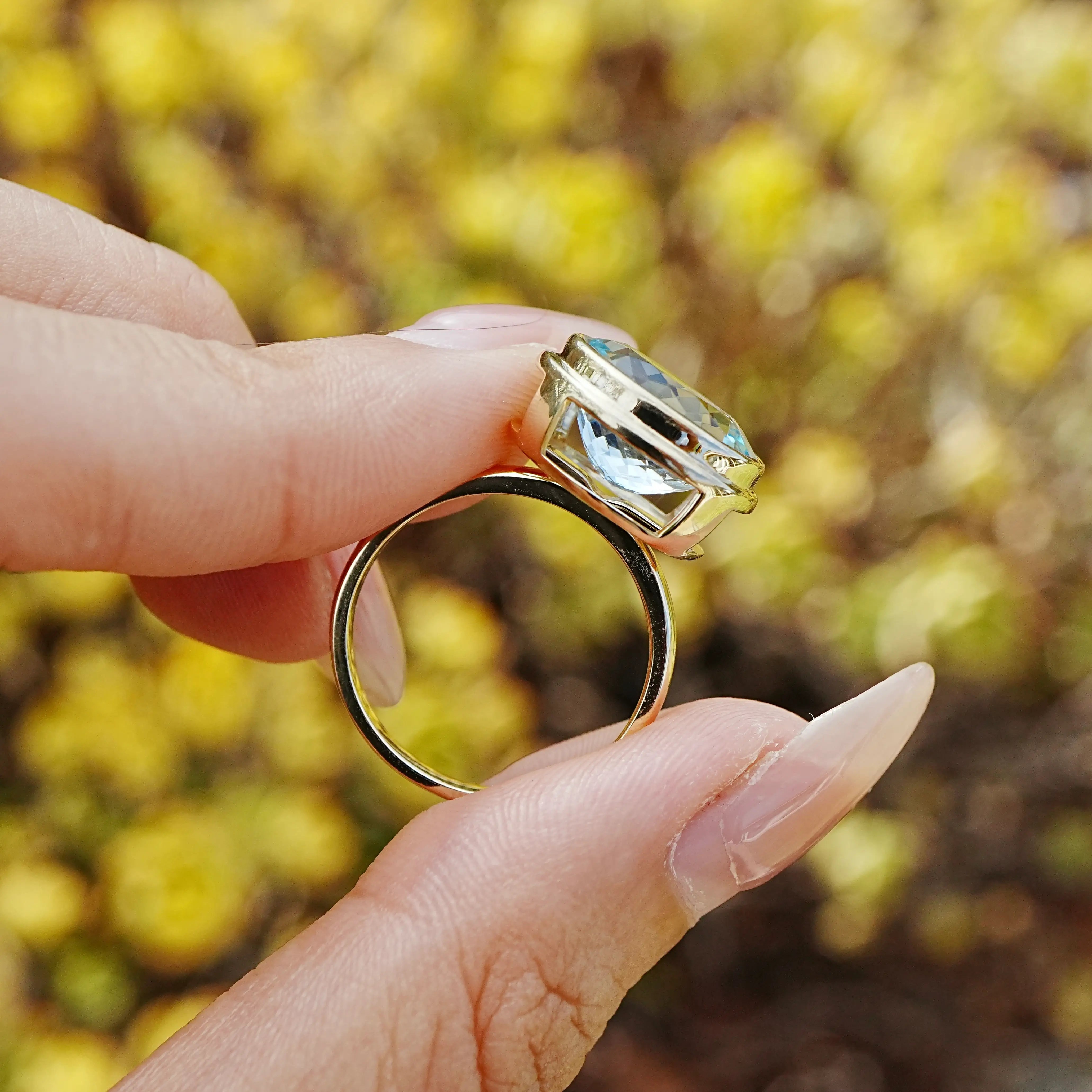 certificate of Bella 4.95 ct AIGS Certified Aquamarine East-West Ring in 14k yellow gold (One-of-a-Kind)