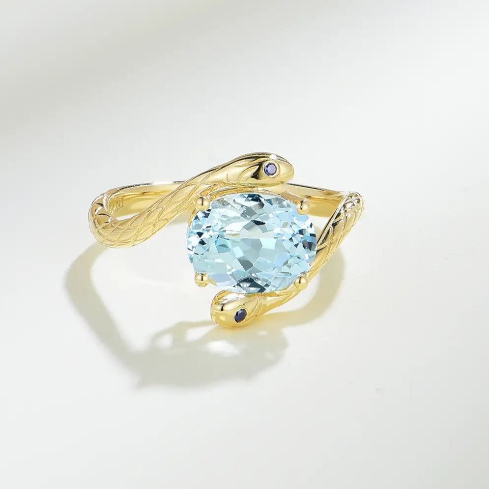 oval cut aquamarine and sapphire ring