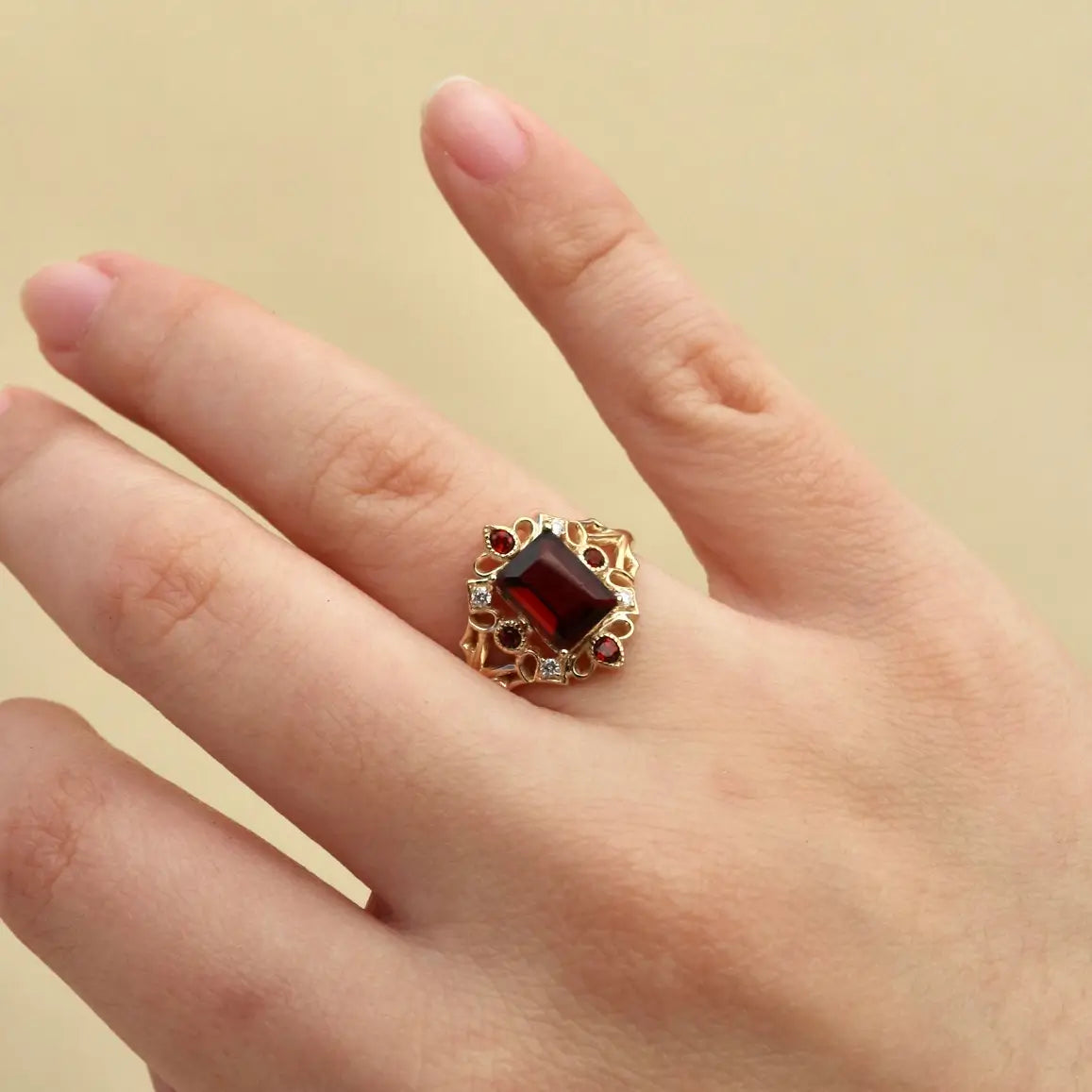 vintage inspired 14k gold emerald cut garnet diamond cocktail ring