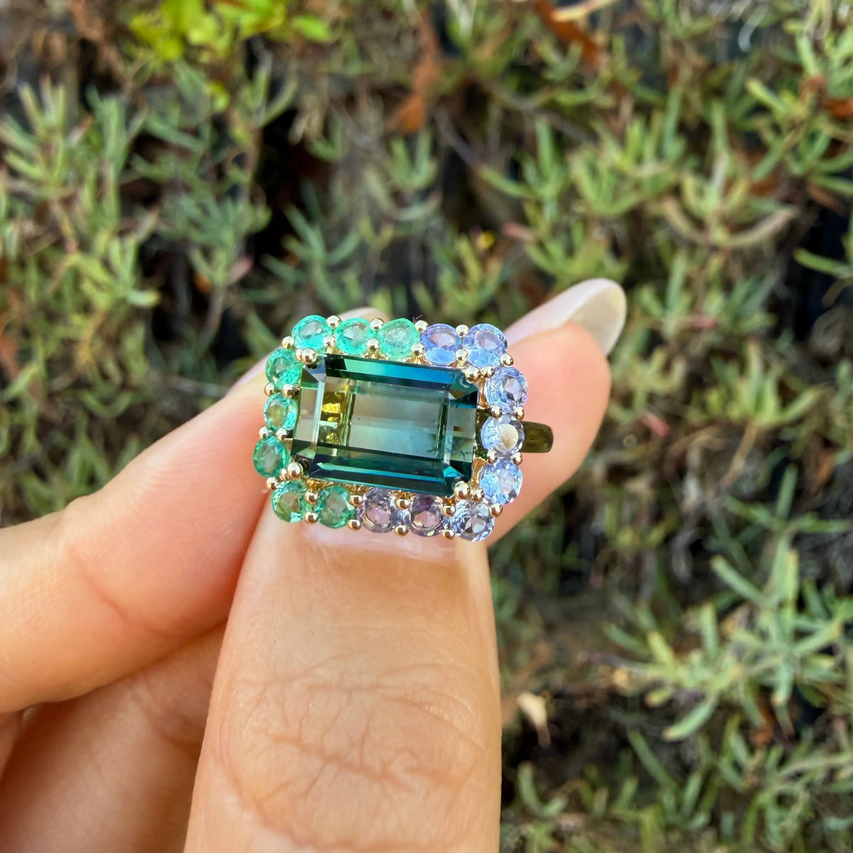 14k yellow gold Eden Halo 4.36 ctw Natural Bi-Color Teal Toumaline, Emerald & Tanzanite East-West Ring (One-of-a-Kind)