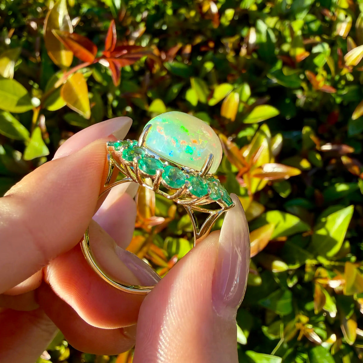 14k yellow gold Eden Halo 8.05 ctw Natural Opal & Emerald East-West Ring (One-of-a-Kind)