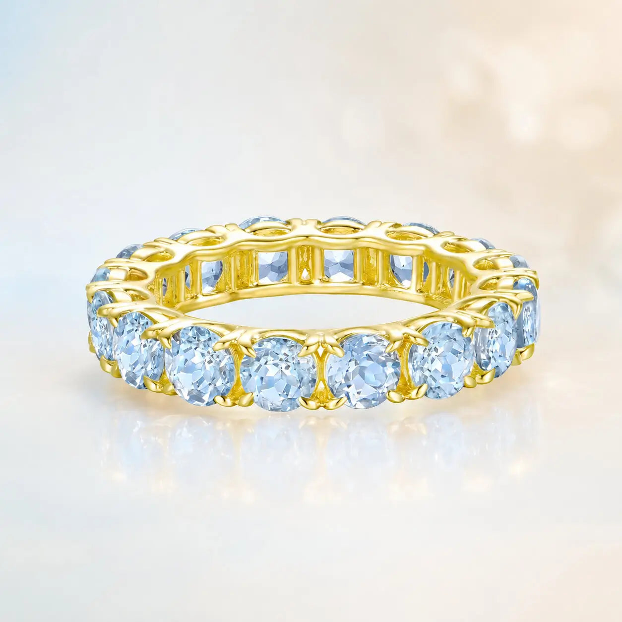 Nora Round Natural 4ctw Aquamarine Eternity Ring in 14k yellow gold