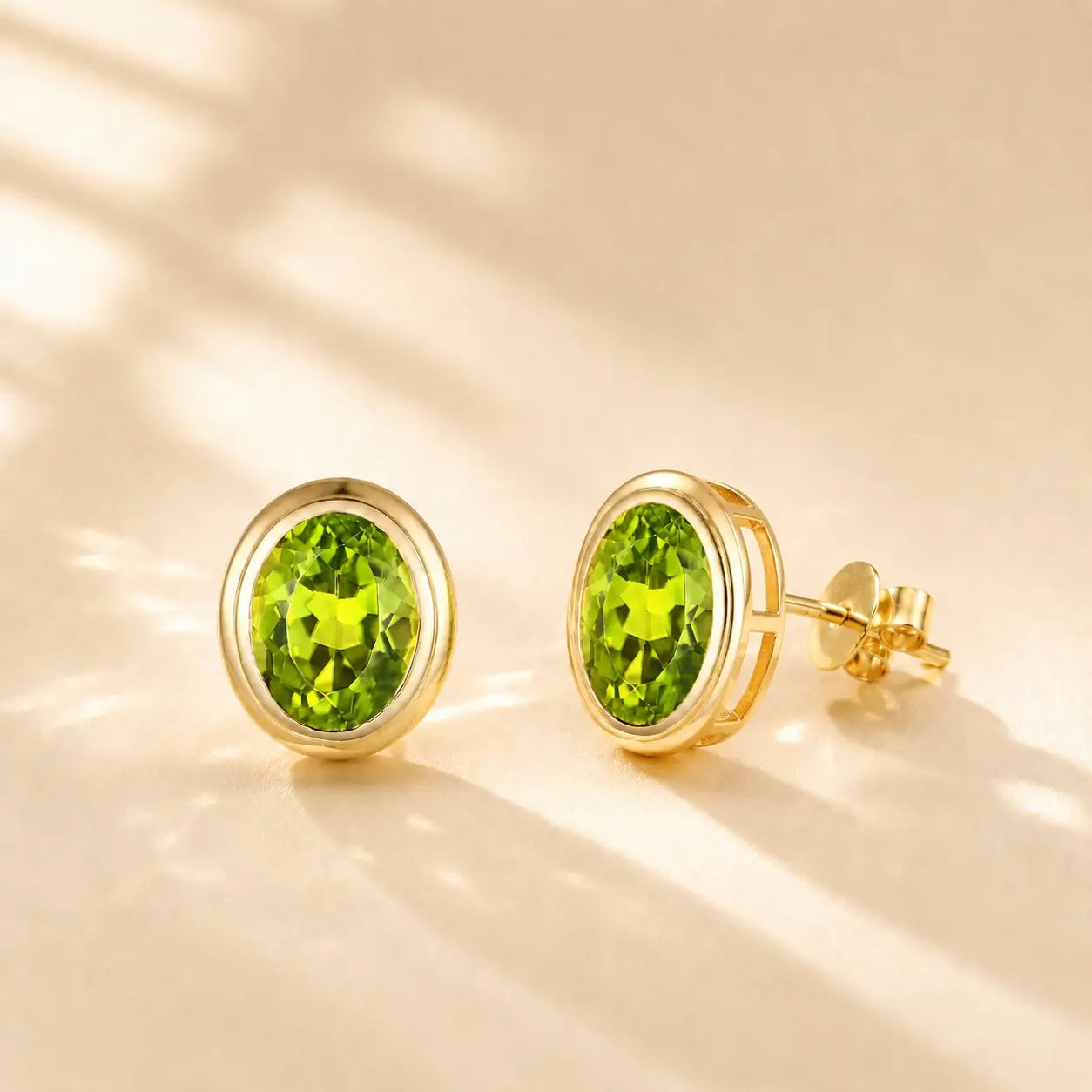 Natural Oval Peridot Earrings 14k yellow gold