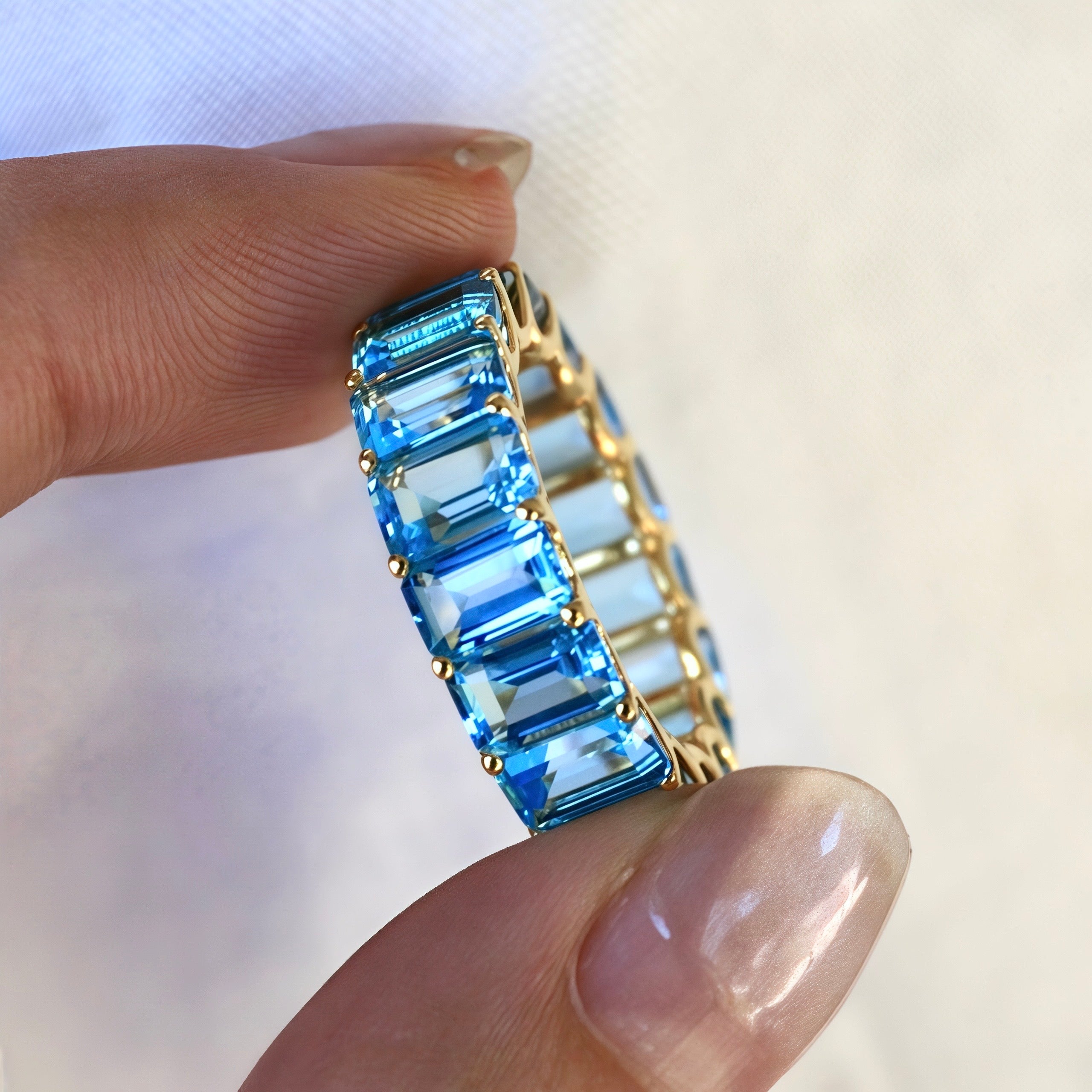 Nora Emerald-Cut Topaz Eternity Ring
