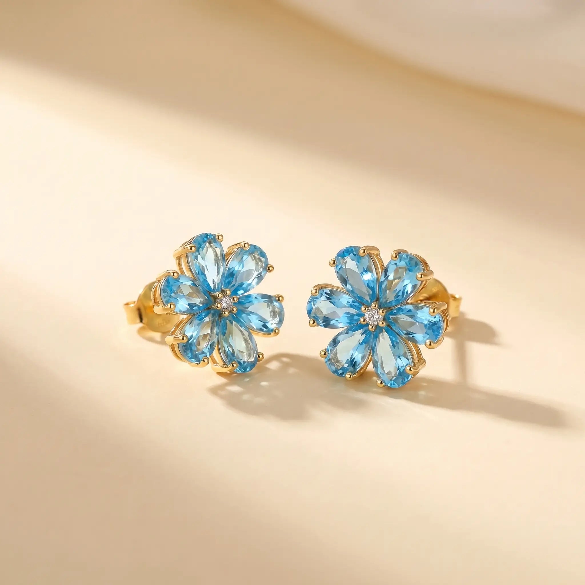 Flora Natural blue Topaz Diamond Earrings in 14k yellow gold