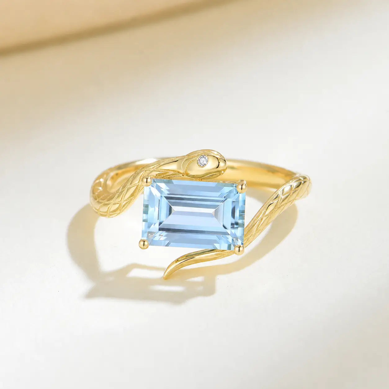 Snake Protection Emerald-Cut Aquamarine & Diamond East-West Ring