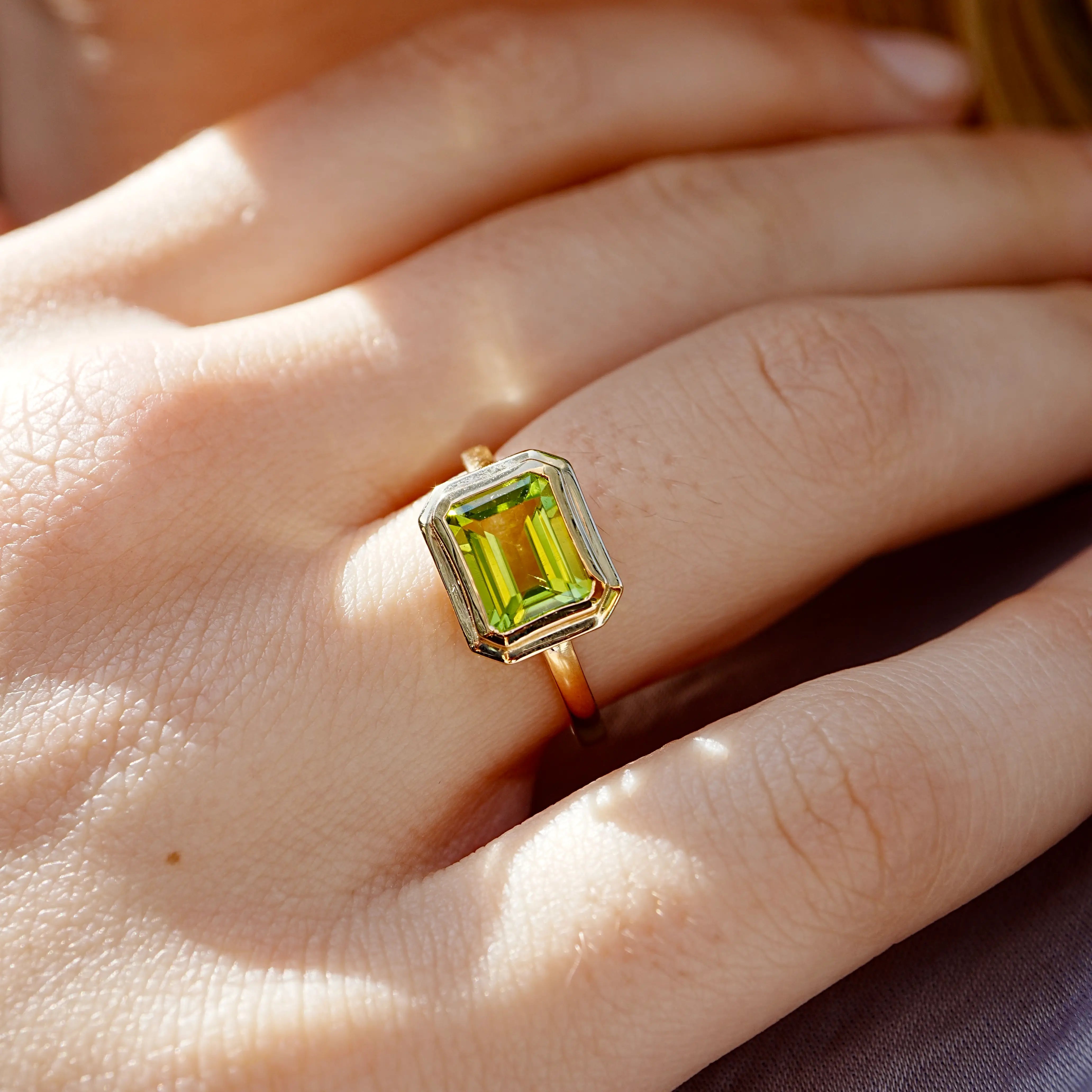 Bella East-West Emerald-Cut Natural Peridot Ring 14k yellow gold