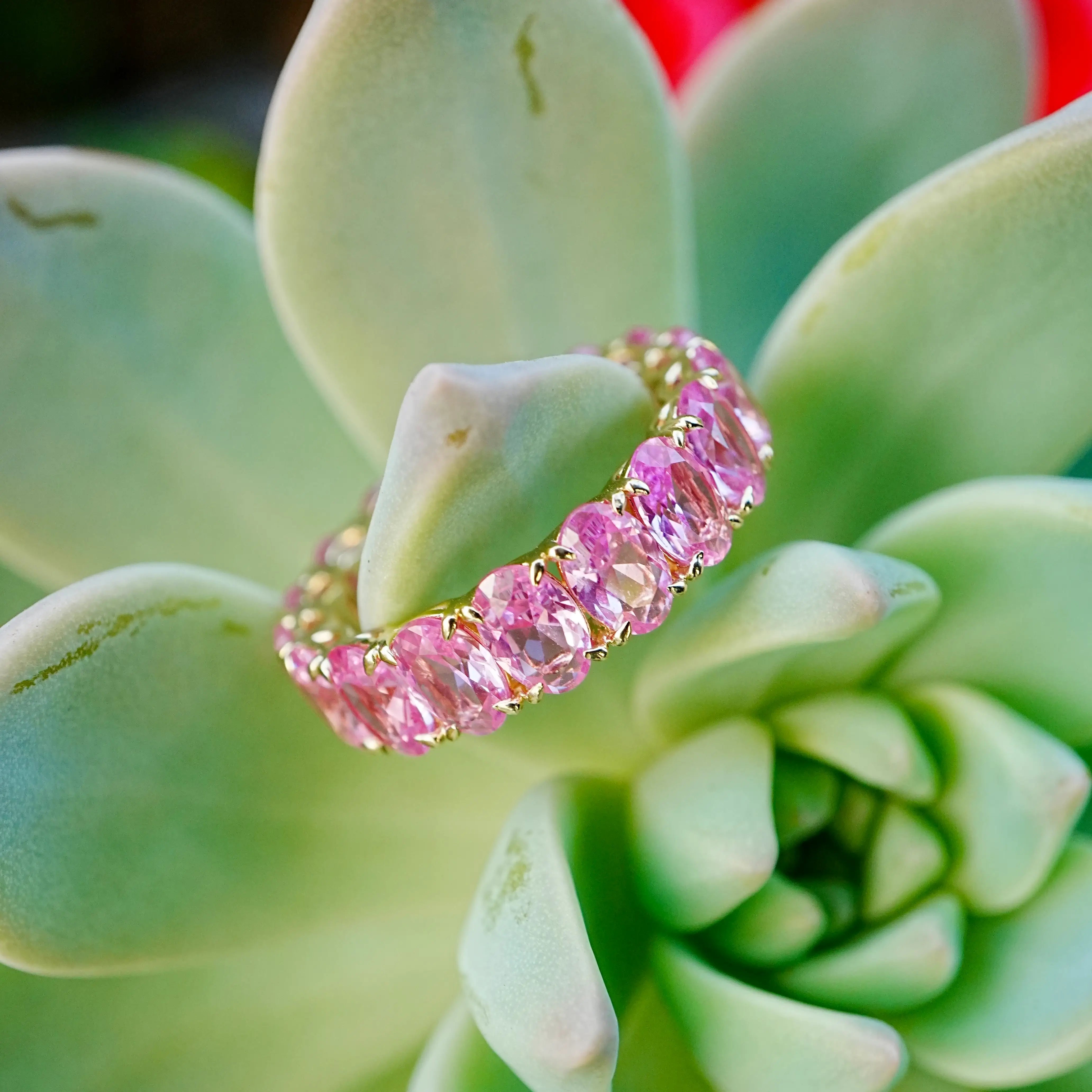 Nora 11.50 ctw Oval Lab Grown Pink Sapphire Eternity Ring in 14k yellow gold