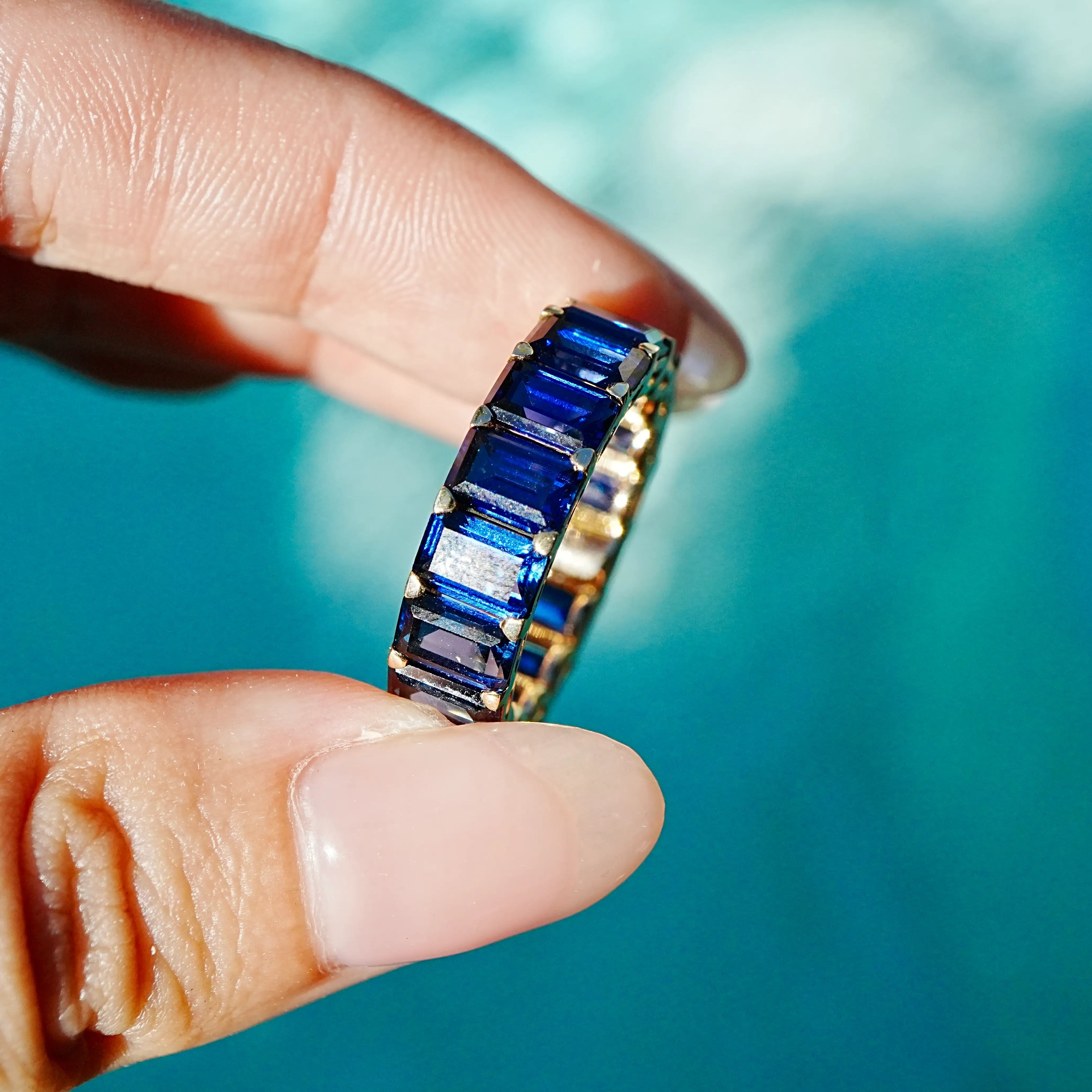 Nora 12.50 ctw Emerald-Cut Lab Grown Sapphire Eternity Ring in 14k yellow Gold