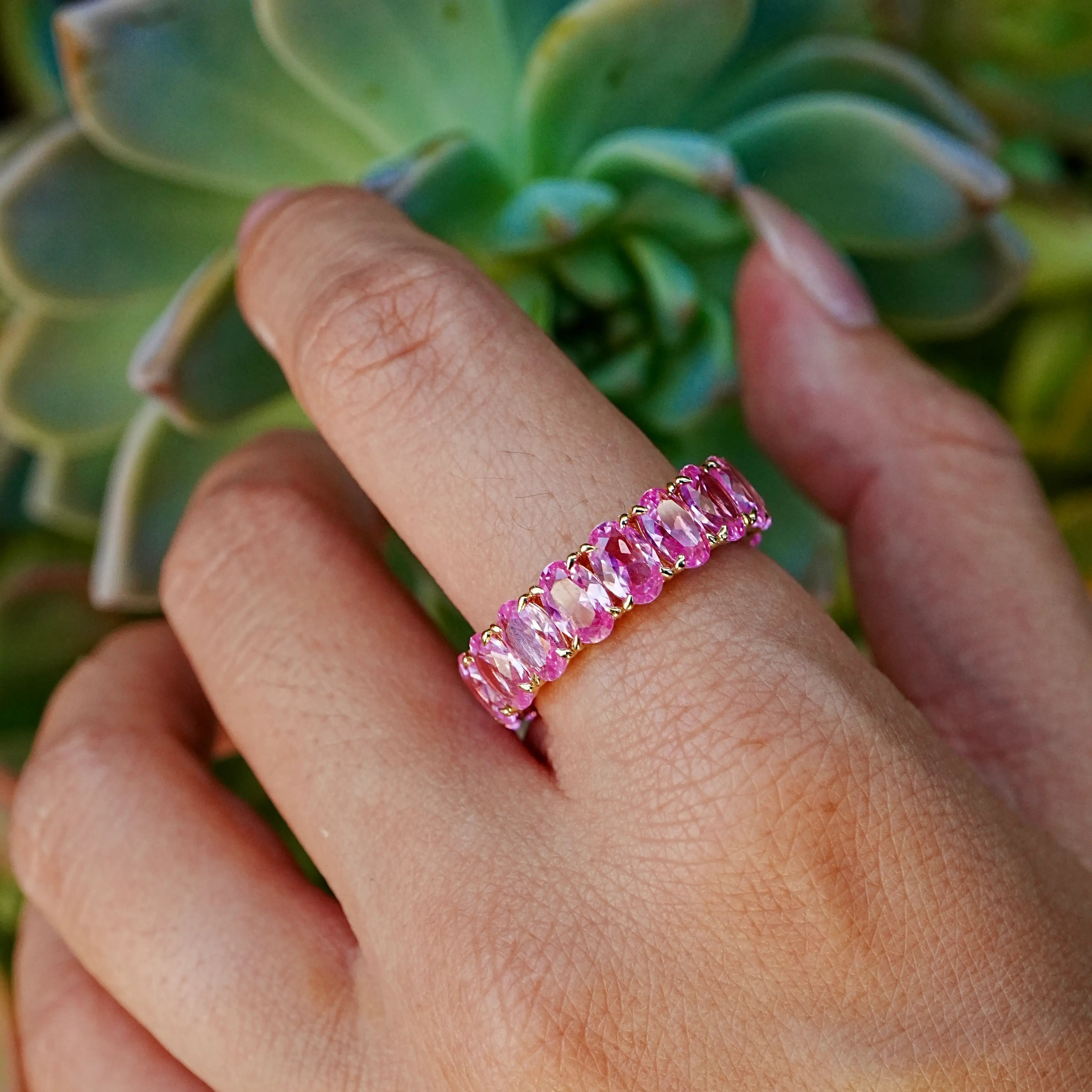 Nora 11.50 ctw Oval Lab Grown Pink Sapphire Eternity Ring in 14k yellow gold