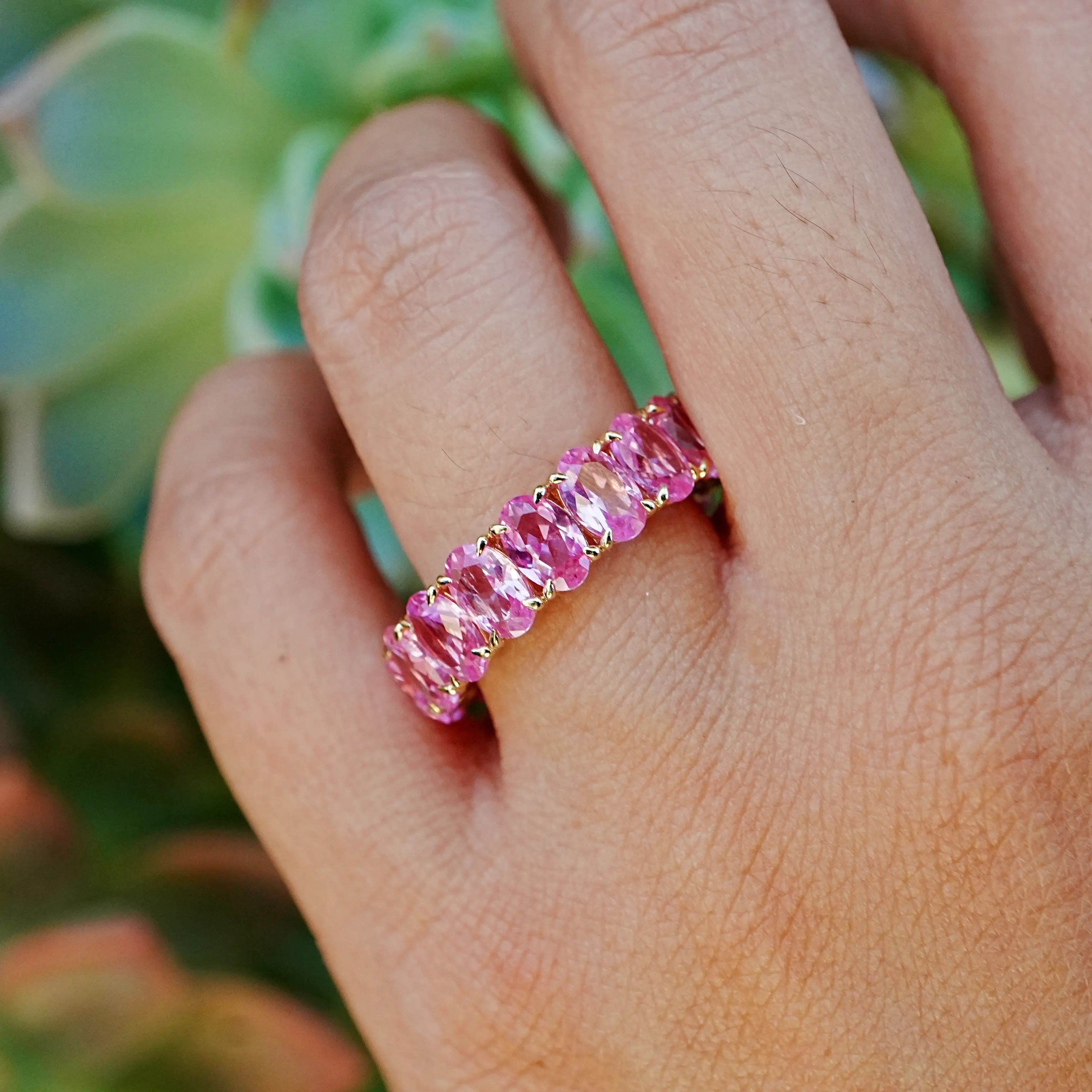 Nora 11.50 ctw Oval Lab Grown Pink Sapphire Eternity Ring in 14k yellow gold