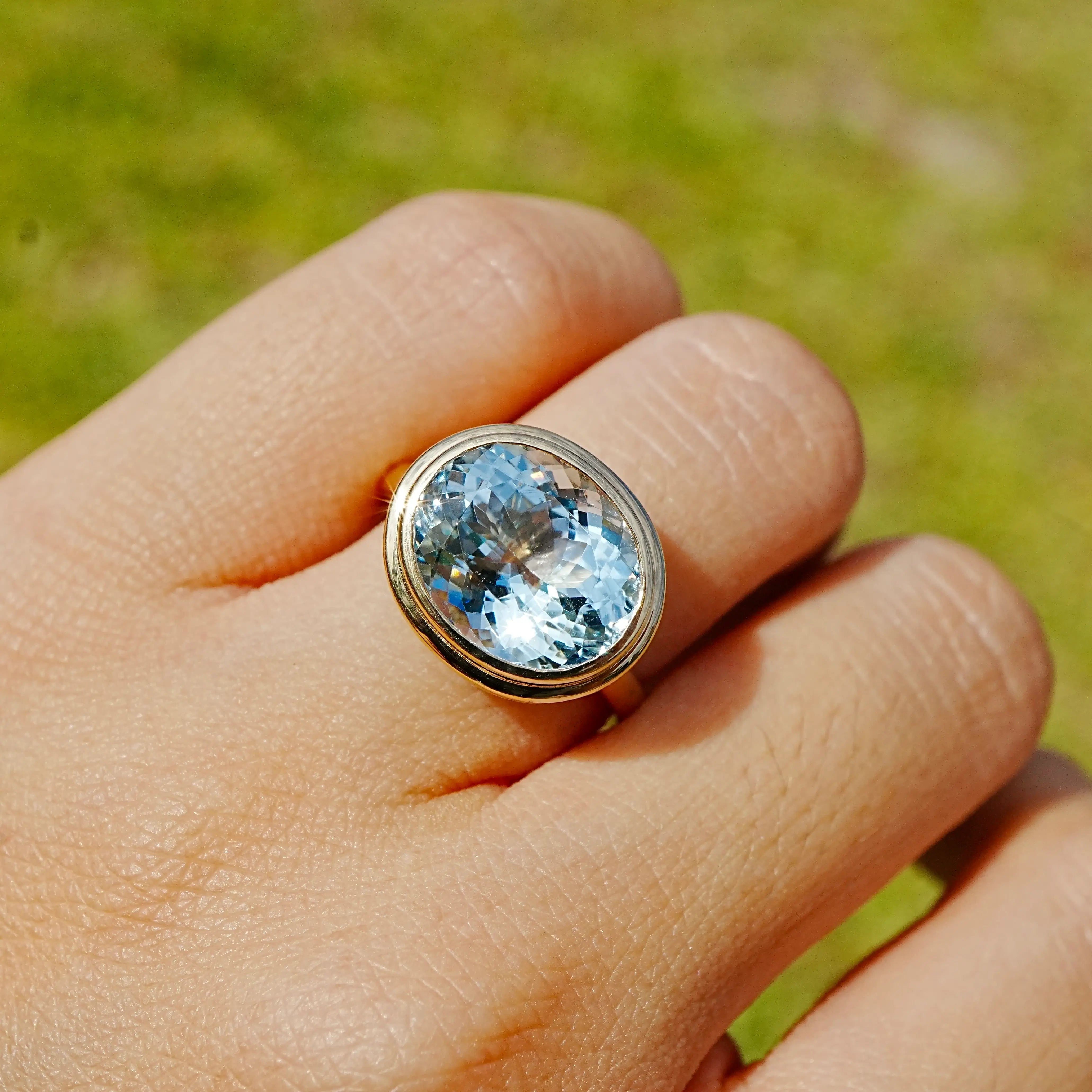 Bella 4.95 ct AIGS Certified Aquamarine East-West Ring in 14k yellow gold (One-of-a-Kind)