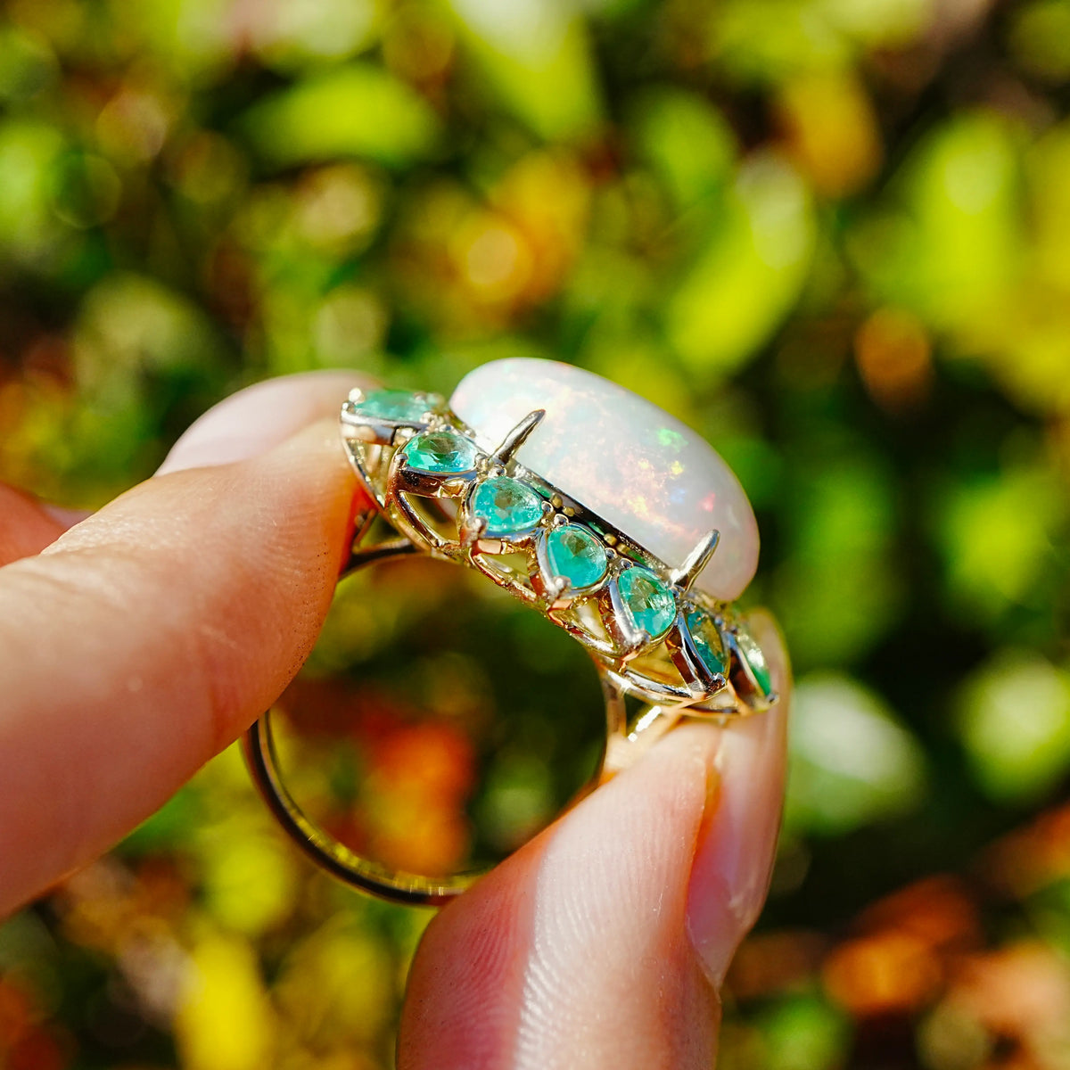 Bloom Halo 9.09 ctw Natural Opal & Emerald East-West Ring (One-of-a-Kind)