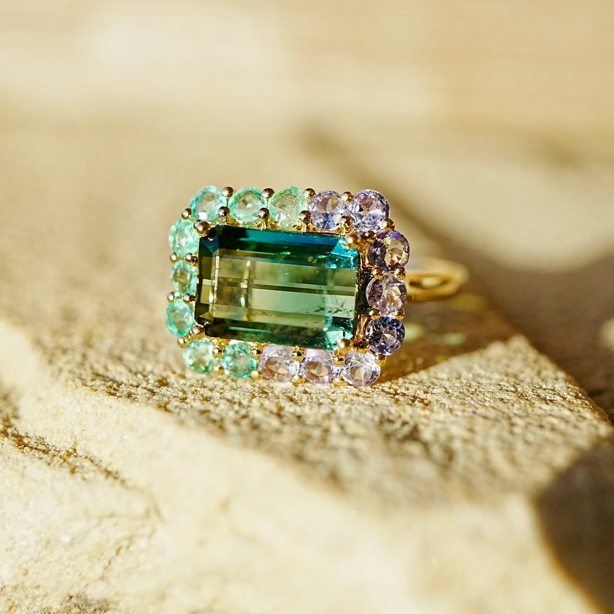 14k yellow gold Eden Halo 4.36 ctw Natural Bi-Color Teal Toumaline, Emerald & Tanzanite East-West Ring (One-of-a-Kind)