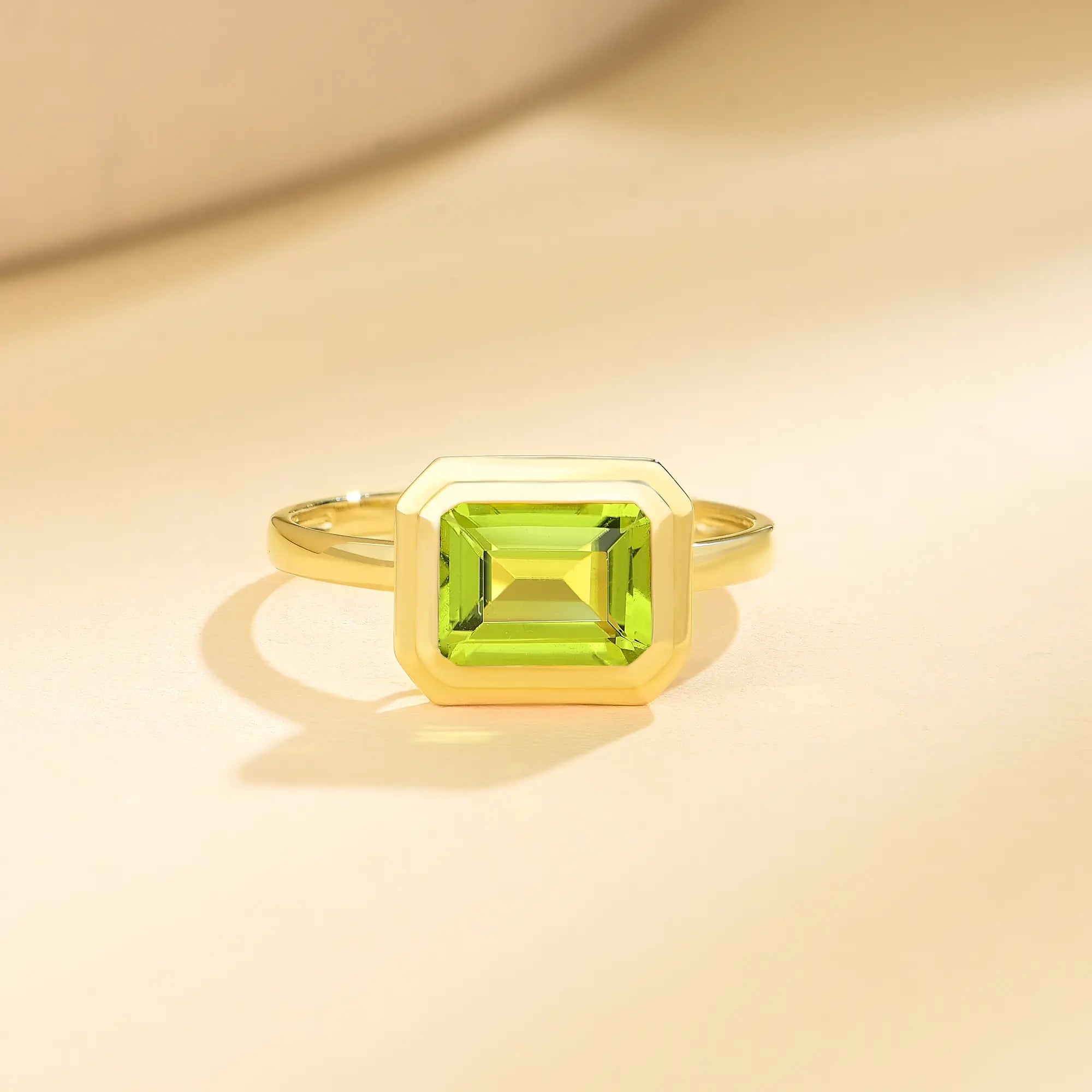 Bella East-West Emerald-Cut Natural Peridot Ring 14k yellow gold