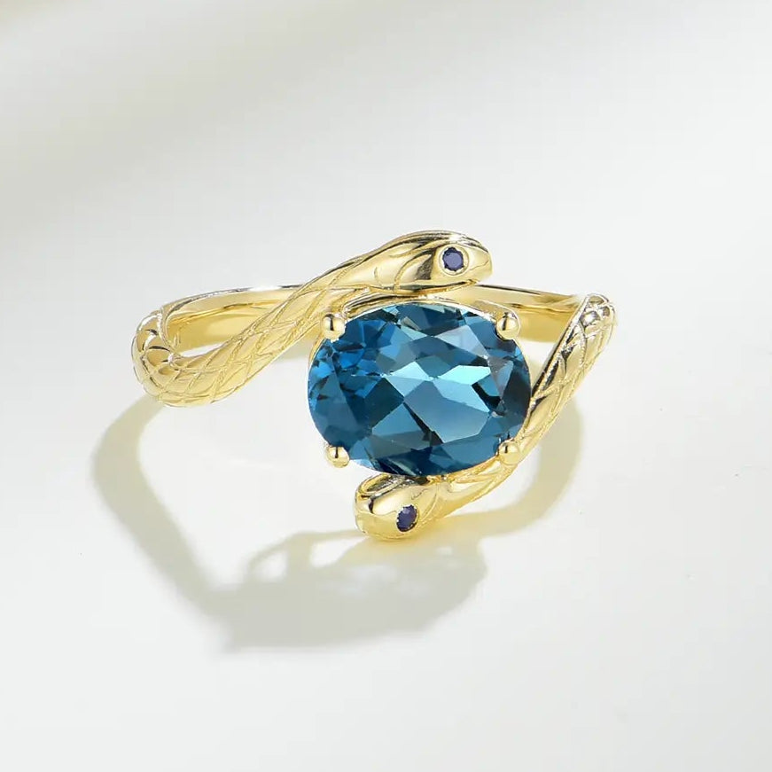 oval cut topaz sapphire ring 14k gold