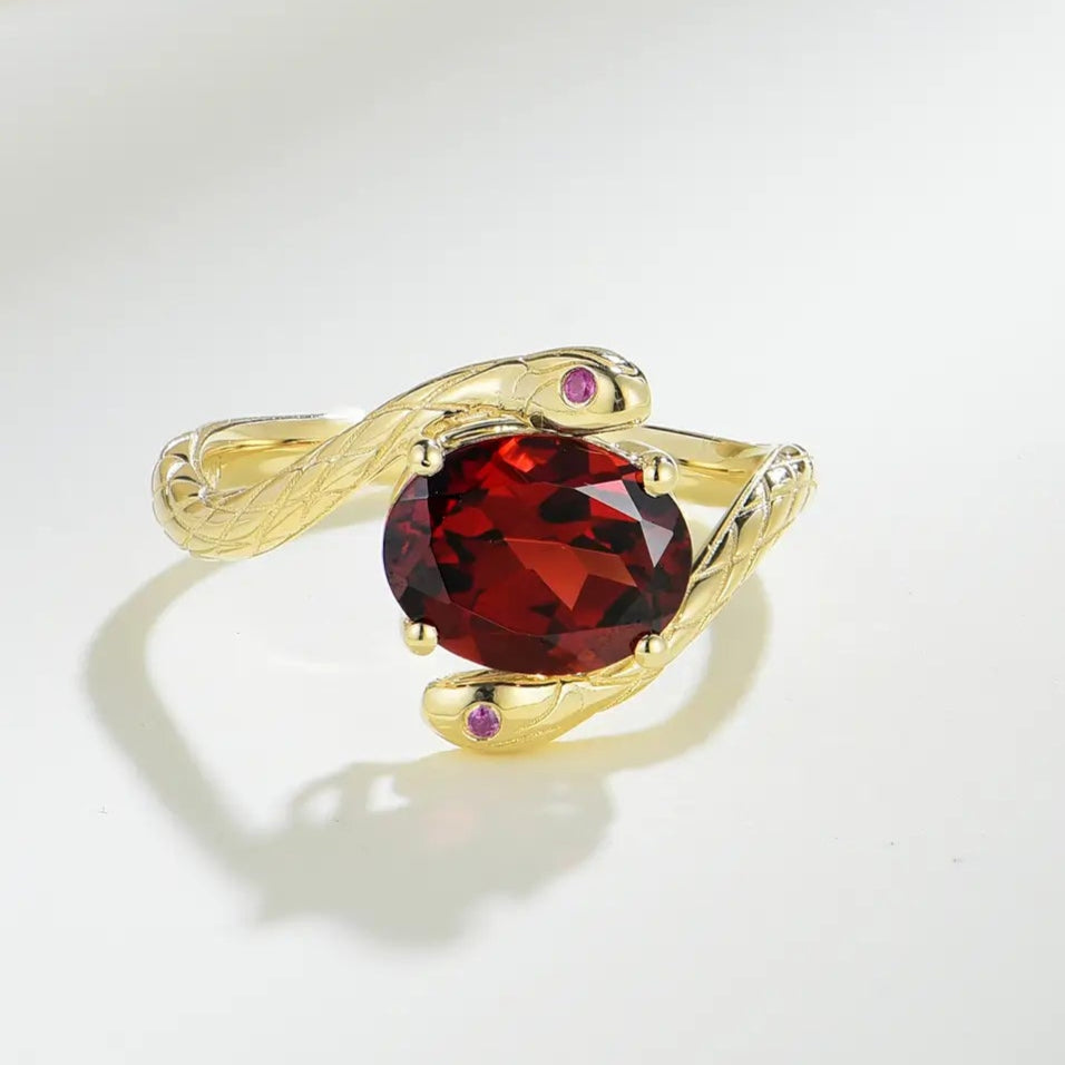 oval cut garnet gold ring