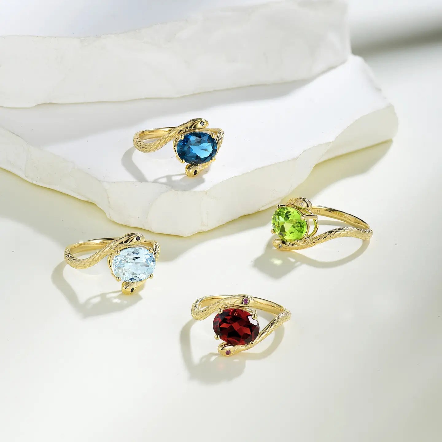 snake design 14kgold gemstone ring 