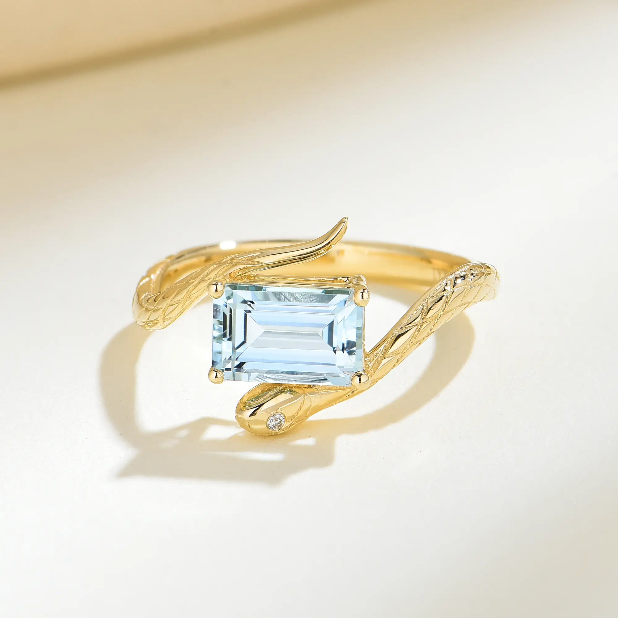 Snake Protection Natural Emerald-Cut Aquamarine & Diamond East-West Ring 14k yellow gold