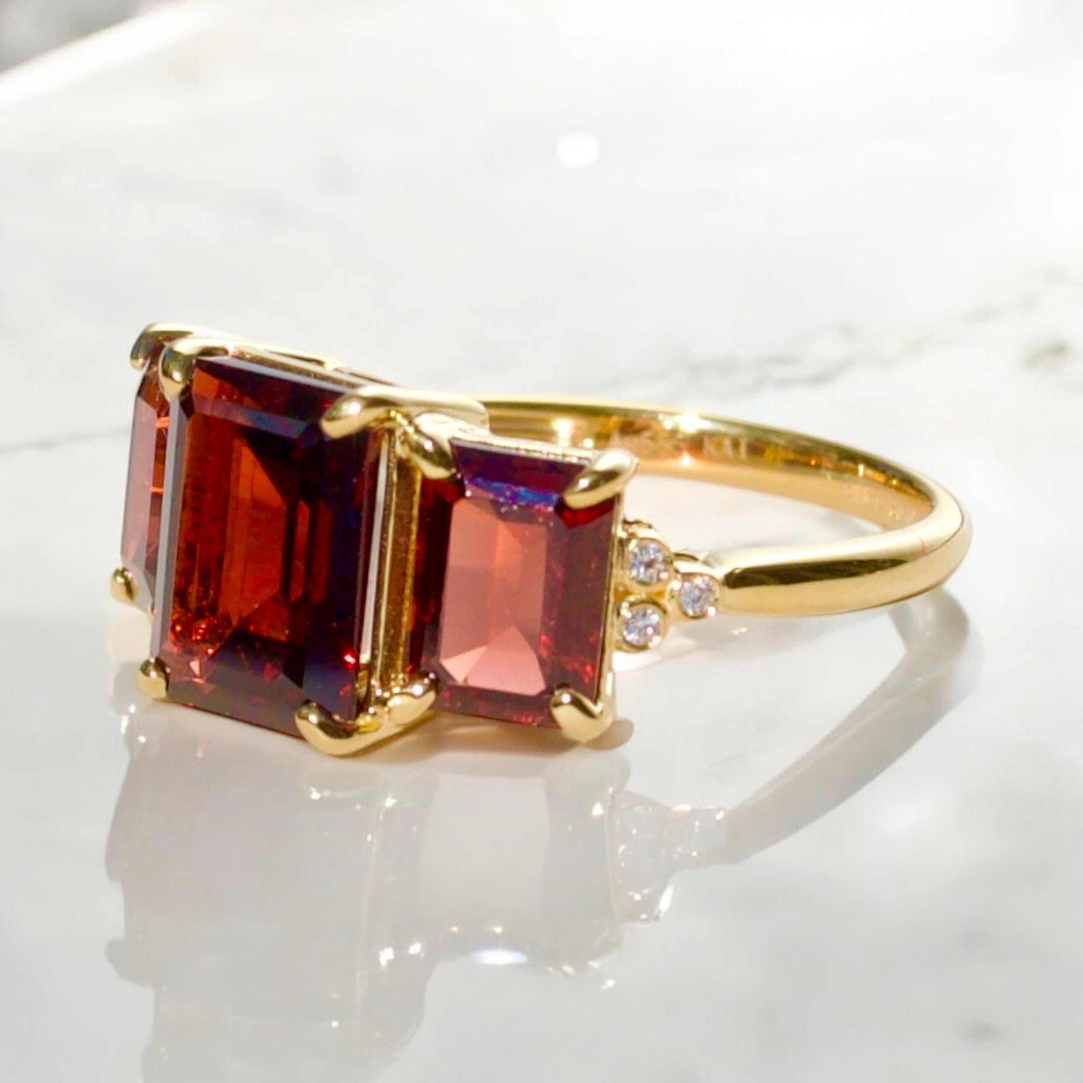 Fortune Garnet Diamond Three-Stone Ring