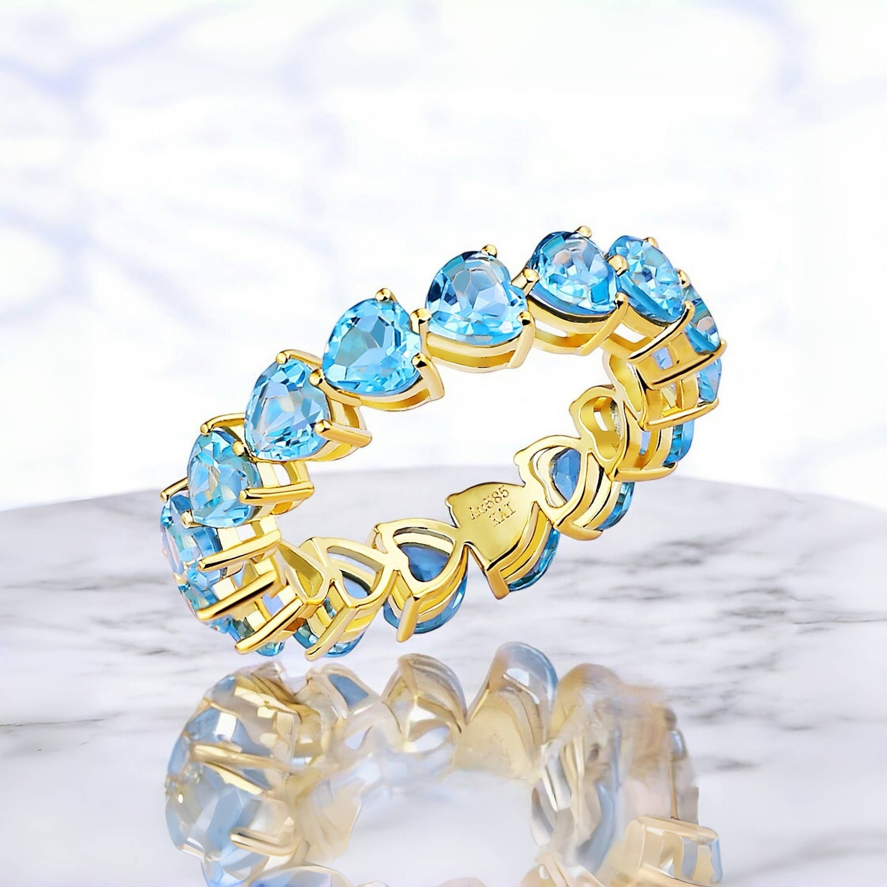 Nora Heart Topaz Eternity Ring